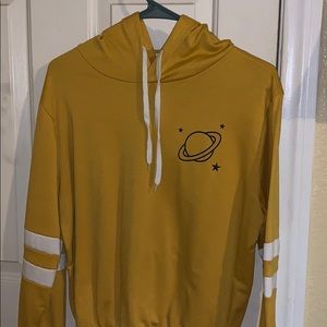 A yellow and white sweatshirt